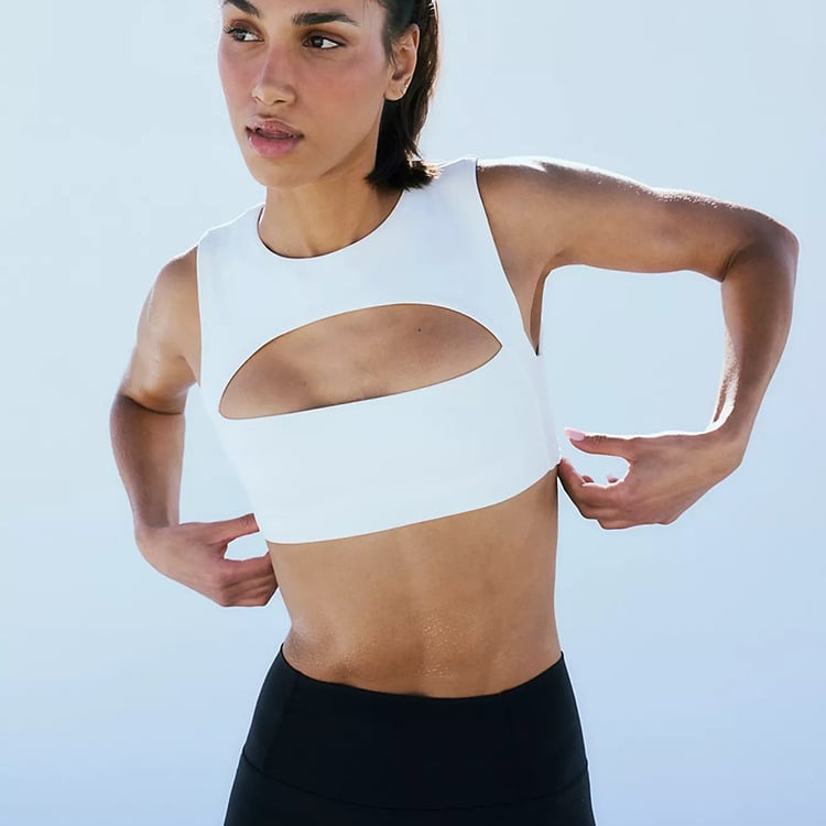 Sexy Hollow Solid Color Sleeveless Short Yoga Top with Chest Pads
