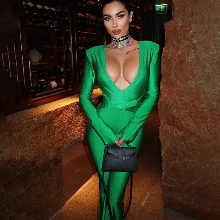 Sexy Deep V Solid Color Slim Flared Jumpsuit