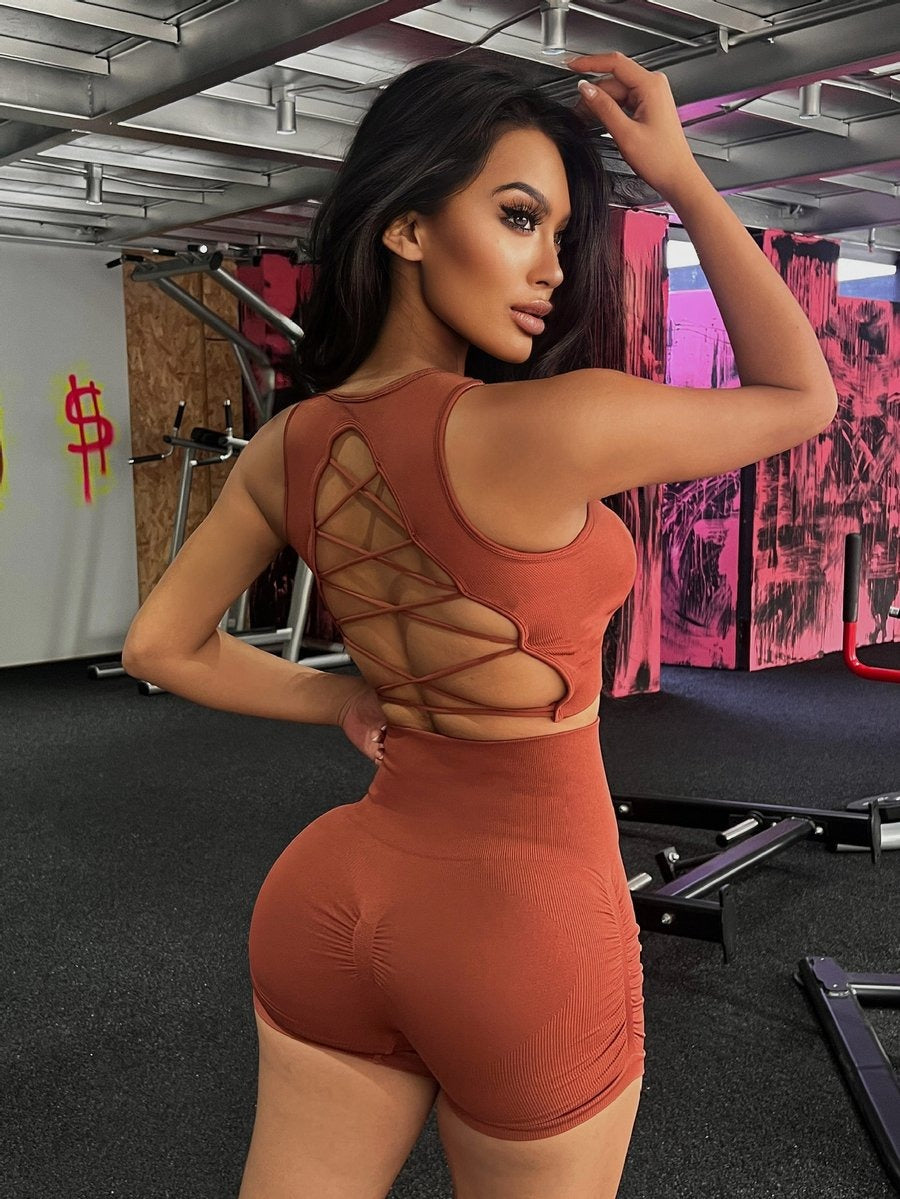 Cross Hollow Solid Color Hip Lifting Yoga Bra Shorts Set With Chest Pads