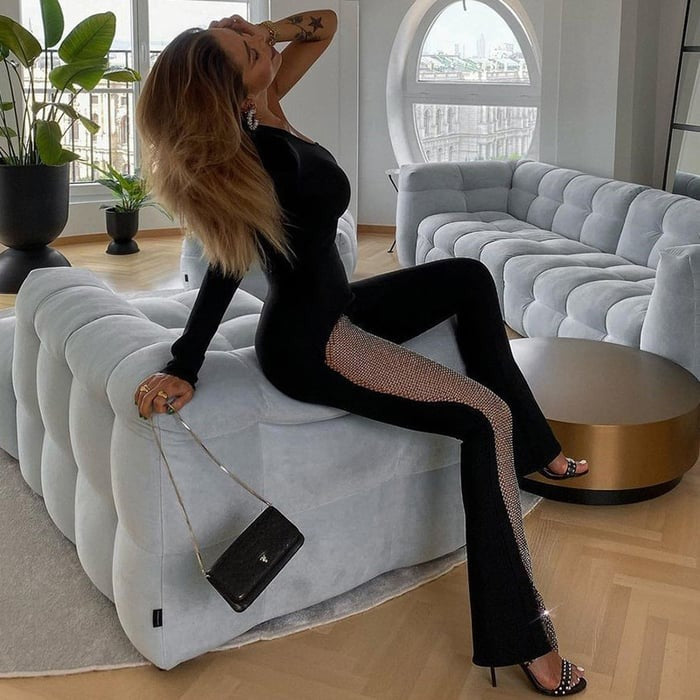 Sexy One-shoulder Long-sleeved Mesh Patchwork Flared Jumpsuit