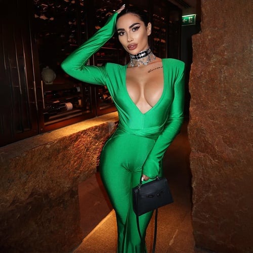Sexy Deep V Solid Color Slim Flared Jumpsuit